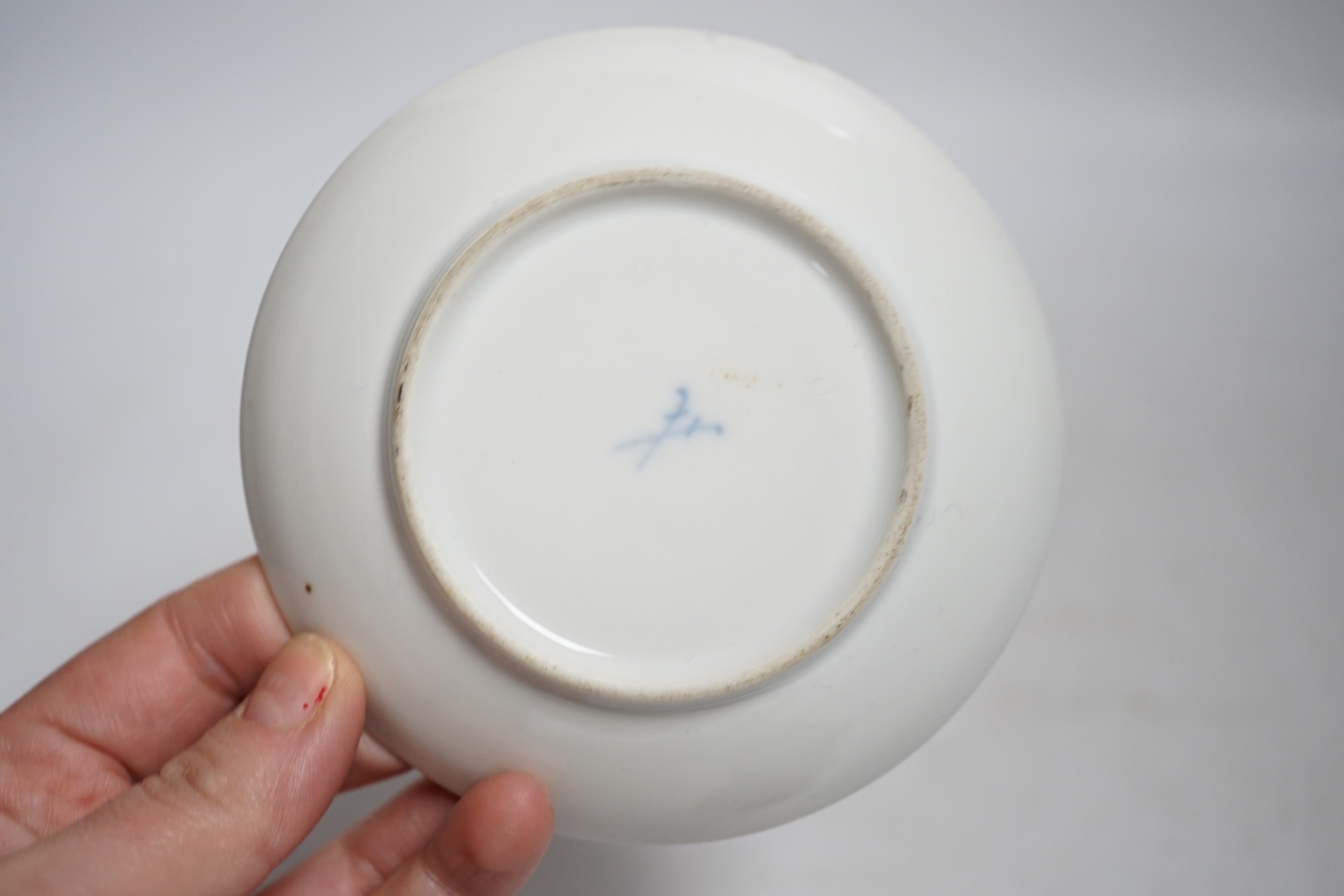 A miniature Dresden teacup and saucer in Meissen-style, cup 4.5cm